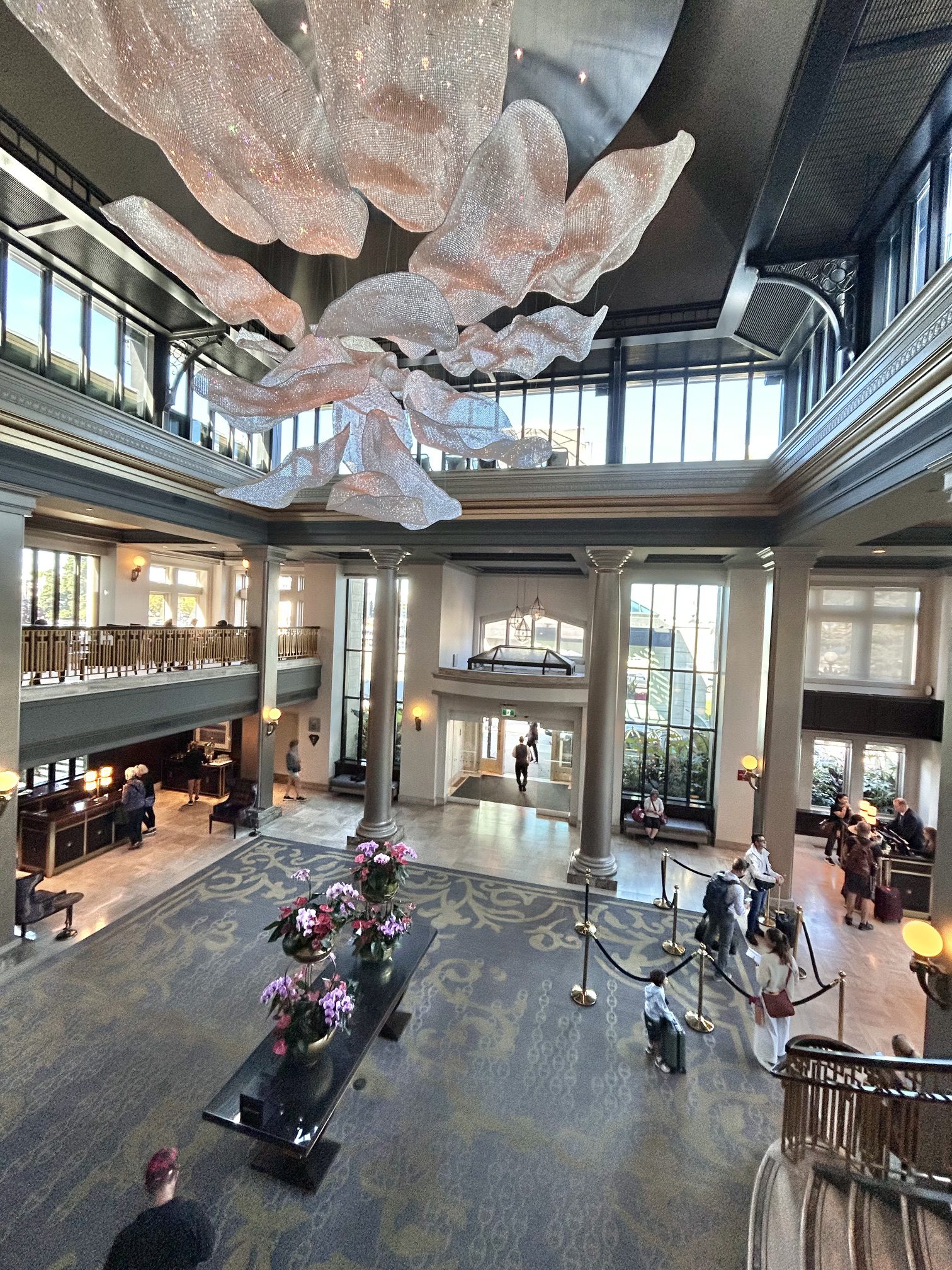 Grand hotel lobby with sculptural chandelier